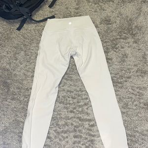 White size 6 lululemon leggings in almost perfect condition only worn few times